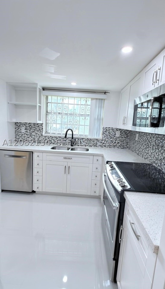 11183 Nw 7th St #104 - Photo 3 of 30