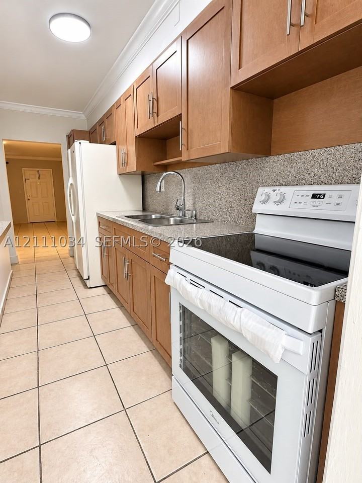 1450 Ne 171st St #104B - Photo 4 of 17