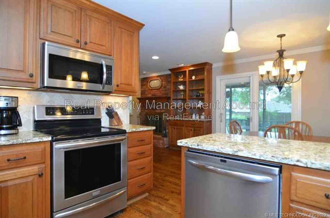 6766 E 66th Pl - Photo 4 of 12