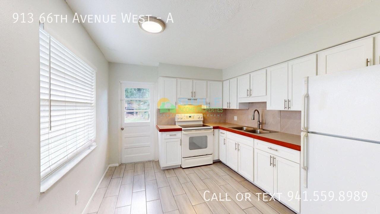 913 66th Ave W - Photo 4 of 8
