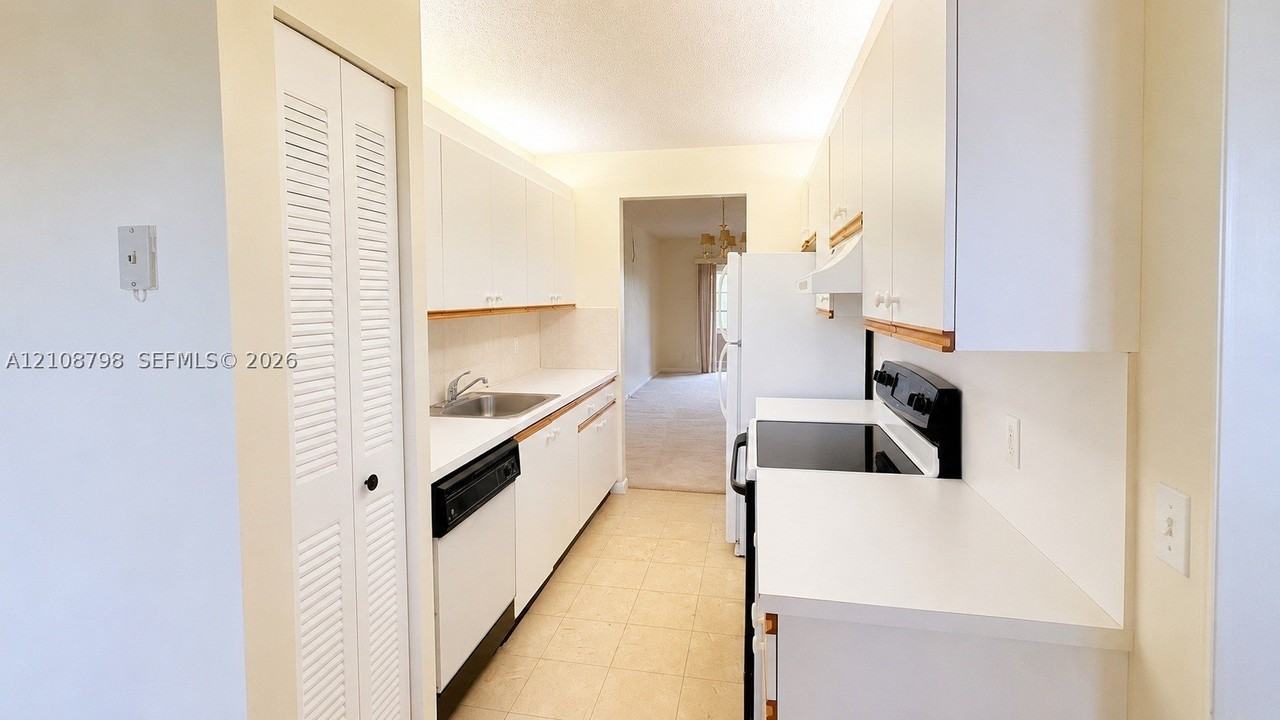 12900 Sw 13th St #413E - Photo 2 of 16