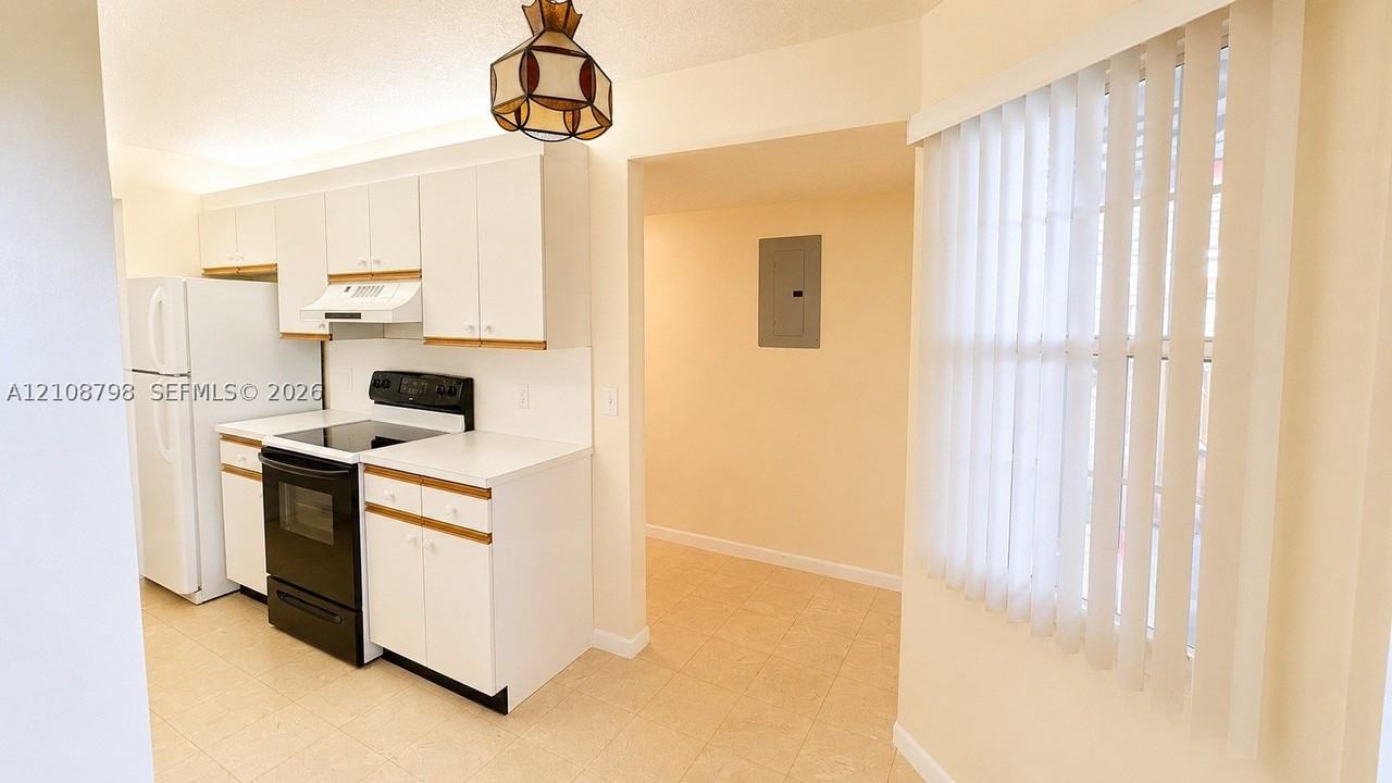 12900 Sw 13th St #413E - Photo 3 of 16