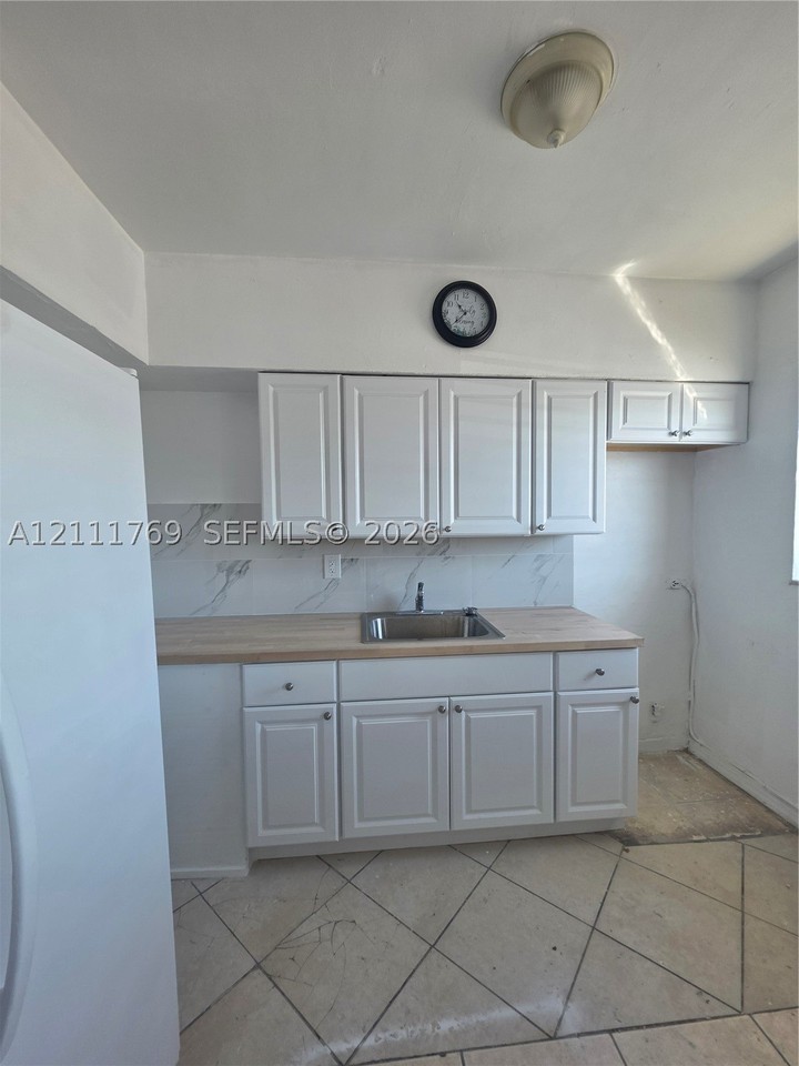 895 80th St #D - Photo 5 of 15
