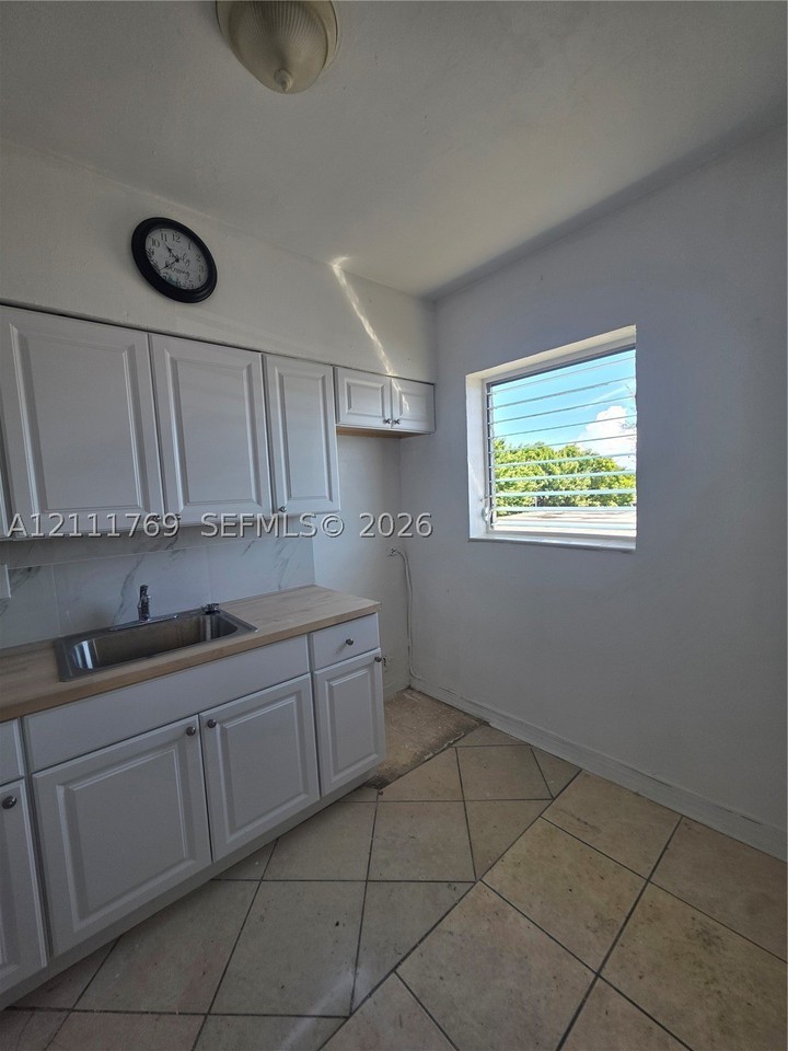 895 80th St #D - Photo 6 of 15