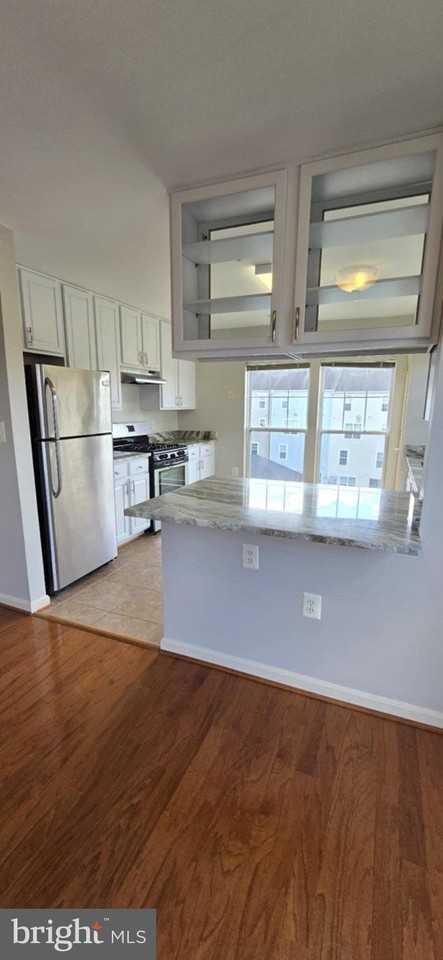 110 Watkins Pond Blvd #301 - Photo 4 of 42
