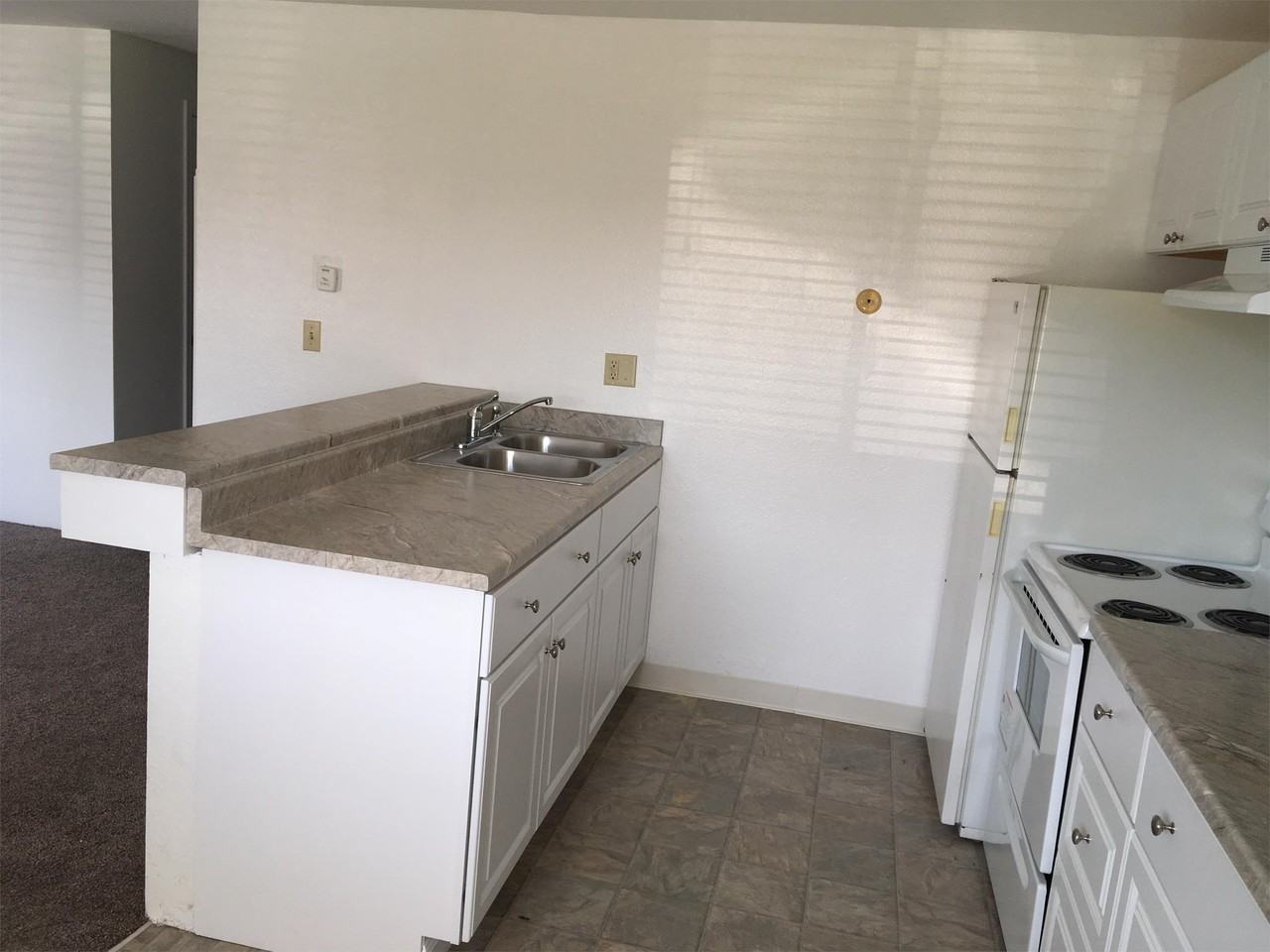 Village Apartments - Photo 3 of 50
