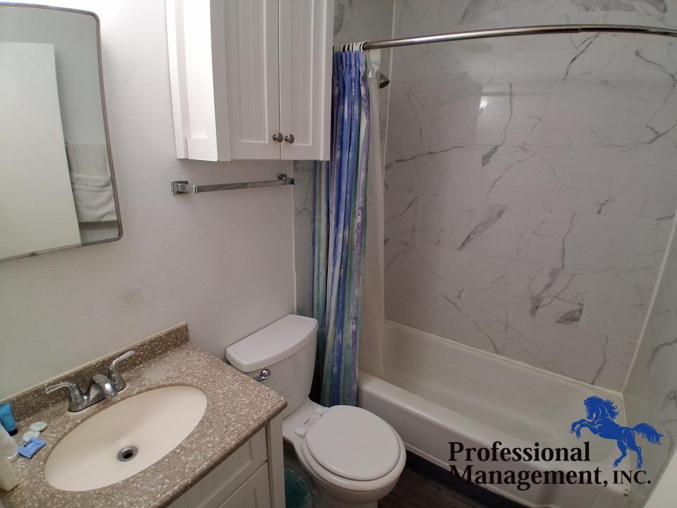 821 Avenue C - Photo 7 of 9