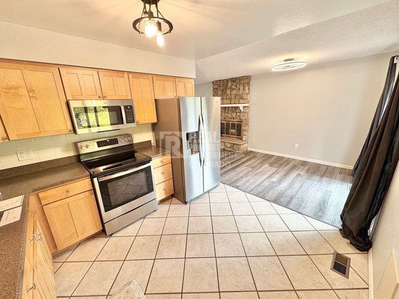 1553 S Tucson St - Photo 6 of 26