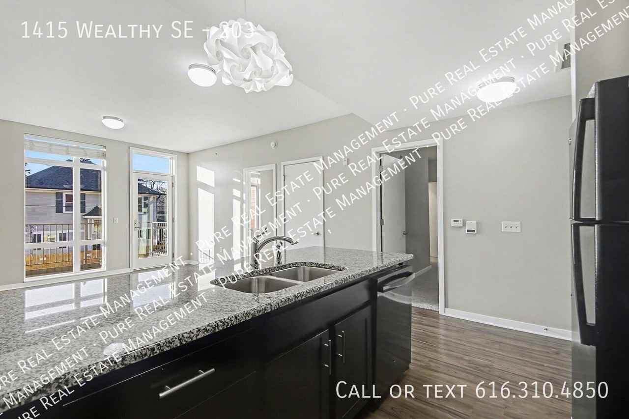 1415 Wealthy St Se #203 - Photo 5 of 7