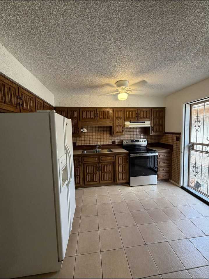 12810 N 113th Ave #3 - Photo 6 of 13