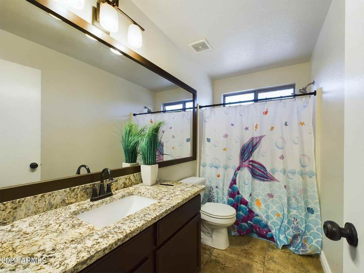8735 W Royal Palm Rd - Photo 4 of 17