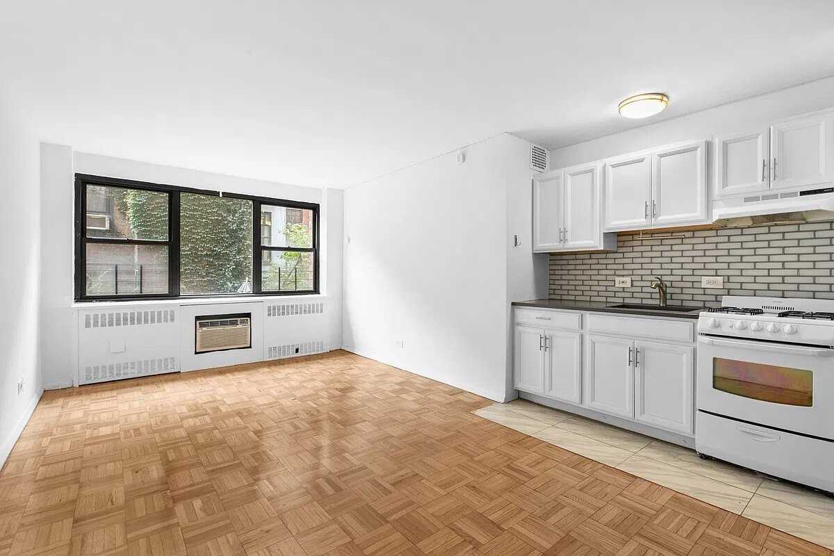 110 E 36th St - Photo 2 of 8