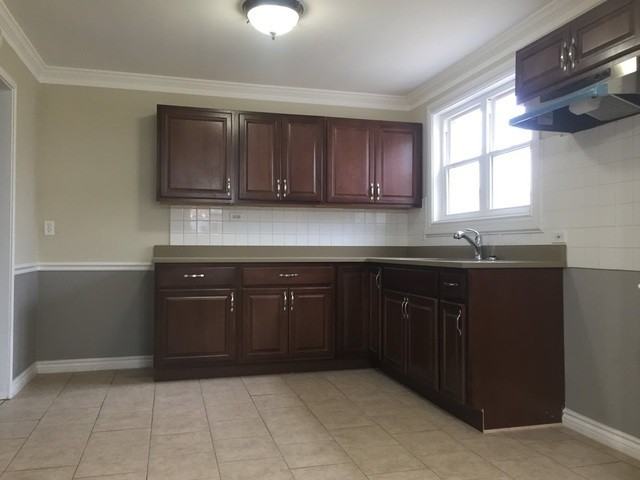 8028 S Kenton Ave - Photo 2 of 8