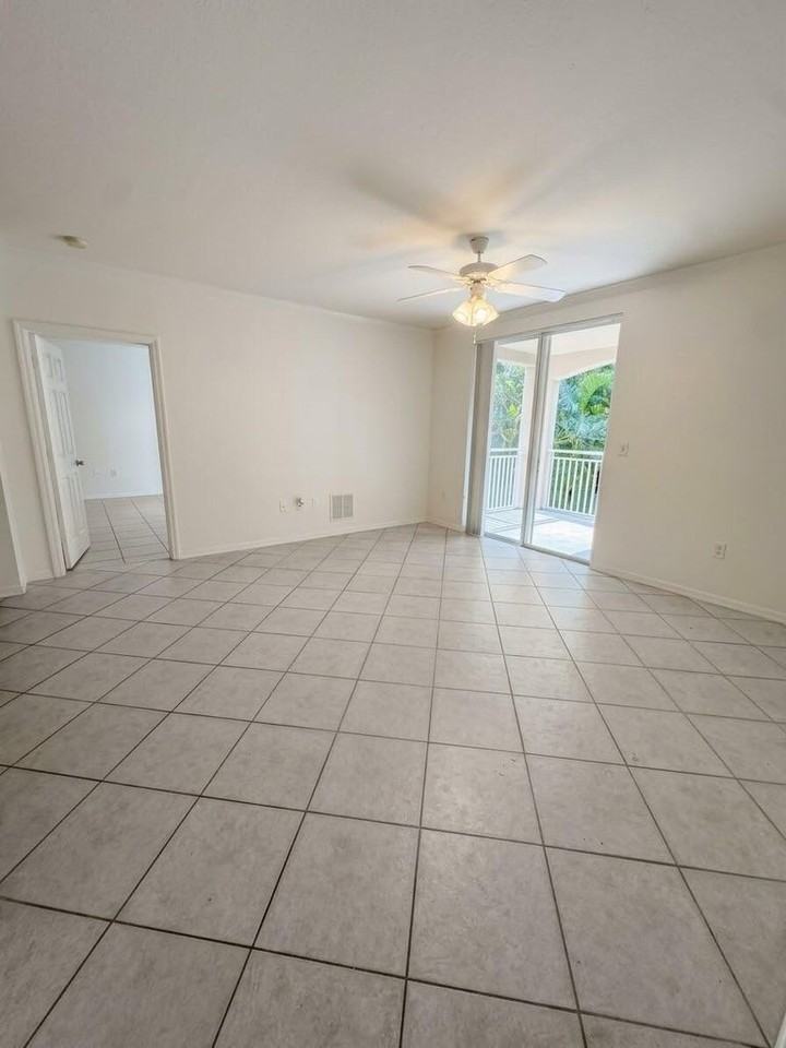 6458 Emerald Dunes Dr #208 - Photo 2 of 18