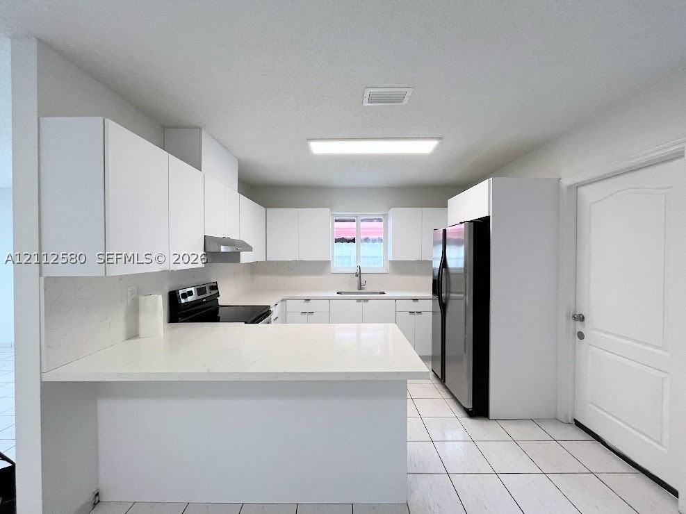 27 Nw 51st Ave #27 - Photo 4 of 18