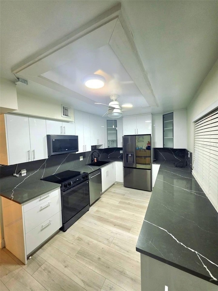 4020 W Palm Aire Dr #402 - Photo 2 of 6
