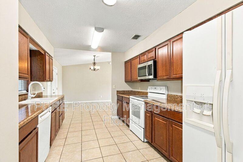 13606 Se 48th Ct - Photo 6 of 50