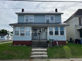 featured image of 103 W 11th St