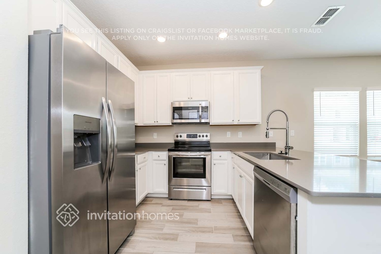 13311 Shore Grass Dr - Photo 6 of 17