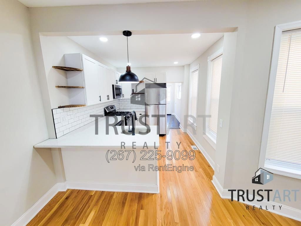 2322 E Clearfield St #1 - Photo 3 of 43