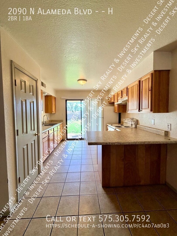 2090 N Alameda Blvd #H - Photo 4 of 16