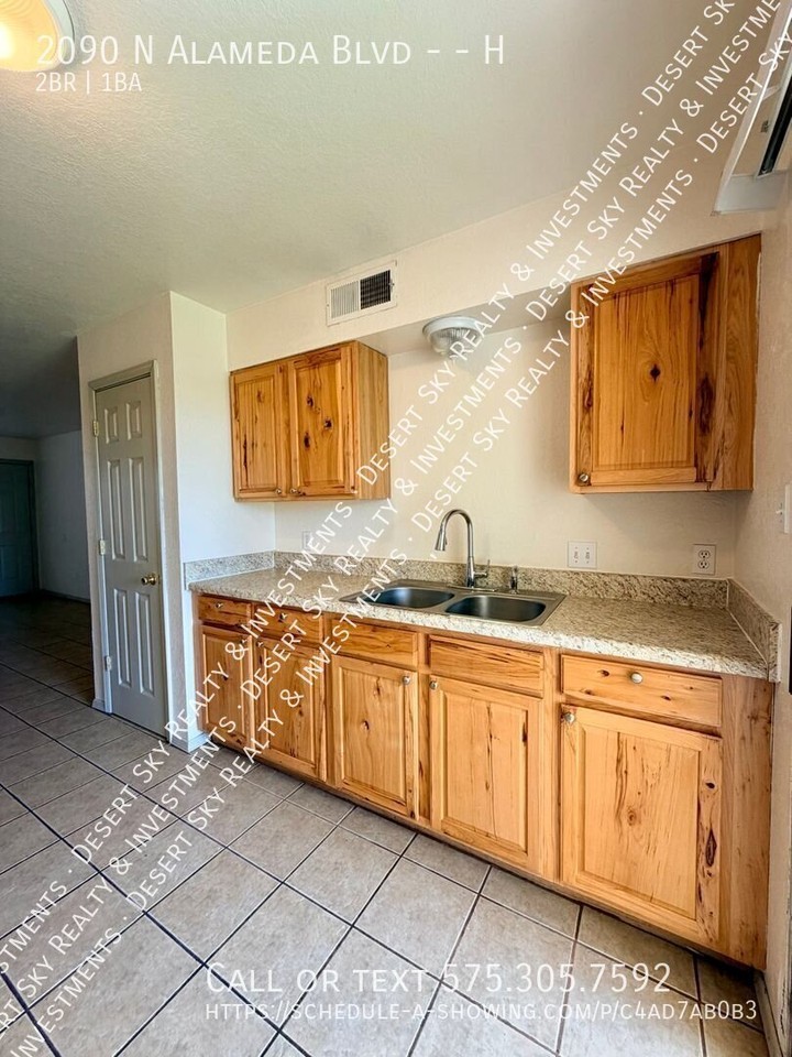 2090 N Alameda Blvd #H - Photo 6 of 16