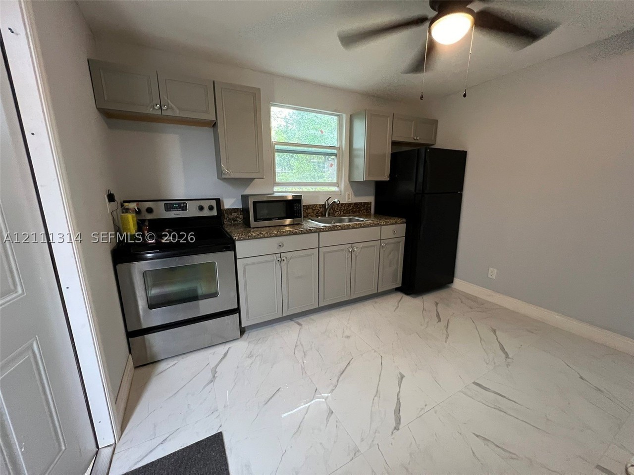 6980 Sw 26th St #1 - Photo 3 of 14