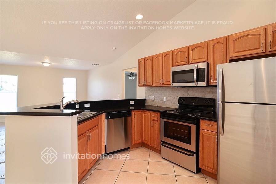 1409 Sw Algardi Ln - Photo 7 of 15