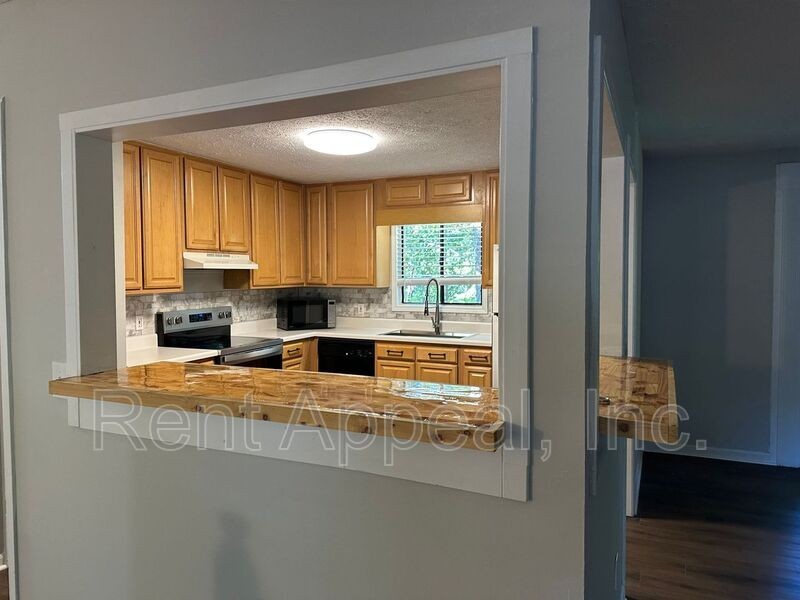 5050 Woodland Dr Nw - Photo 3 of 11