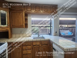 featured image of 8745 Woodman Way
