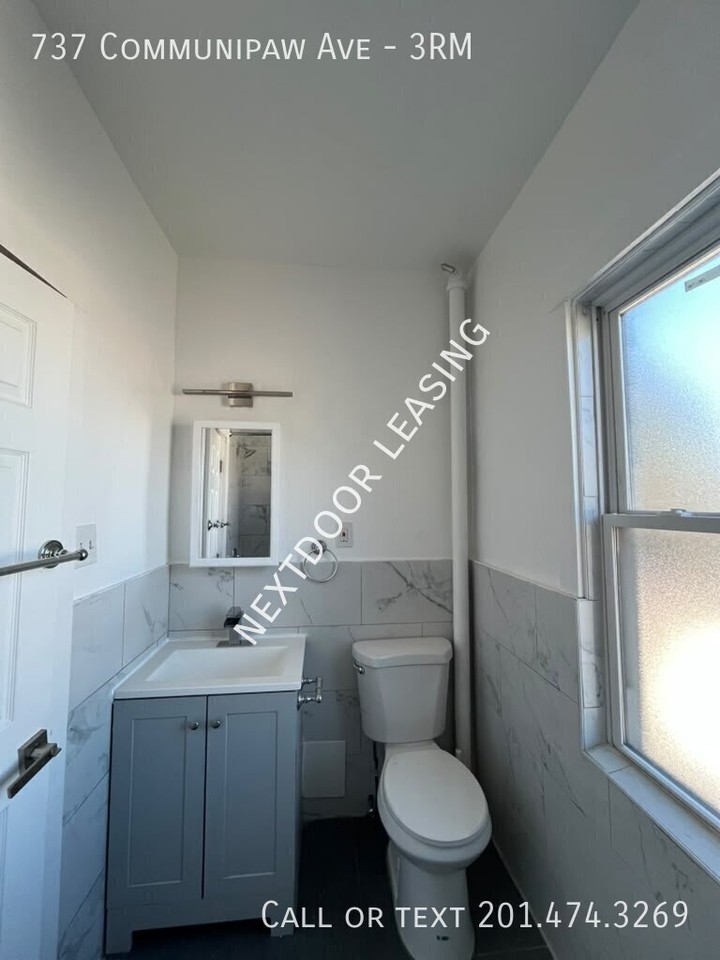 737 Communipaw Ave #3RM - Photo 4 of 11