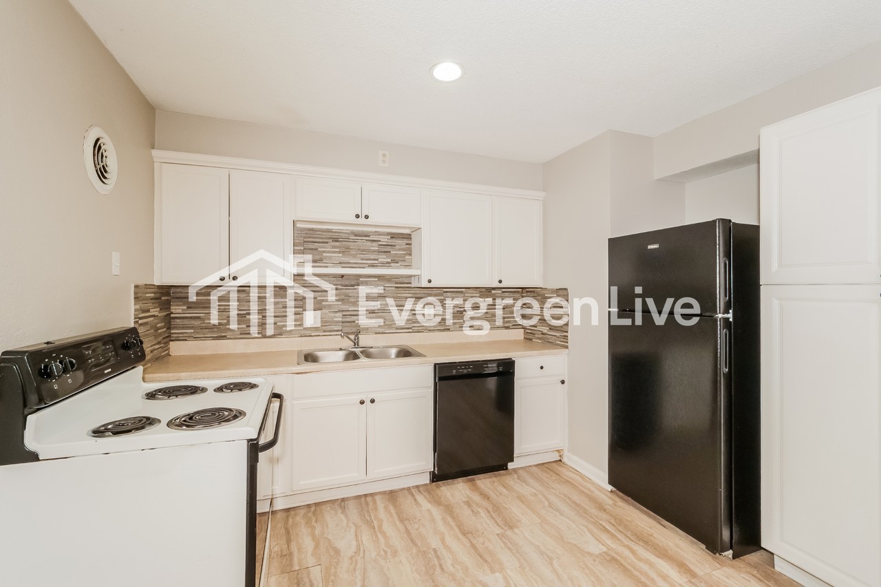 7712 E 111th Ter - Photo 6 of 15