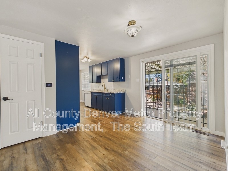 1435 S Ogden St - Photo 5 of 29