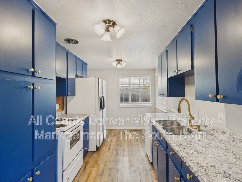 1435 S Ogden St - Photo 6 of 29