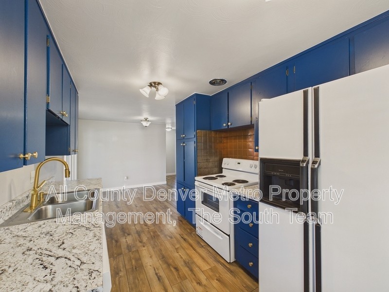 1435 S Ogden St - Photo 7 of 29