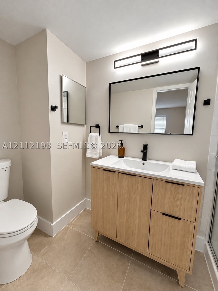 10013 Winding Lake Rd #106 - Photo 5 of 14