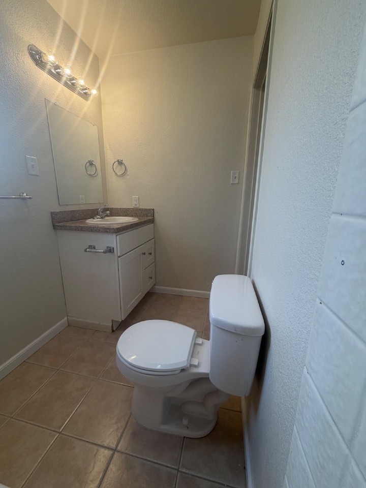 295 E 22nd St - Photo 6 of 18