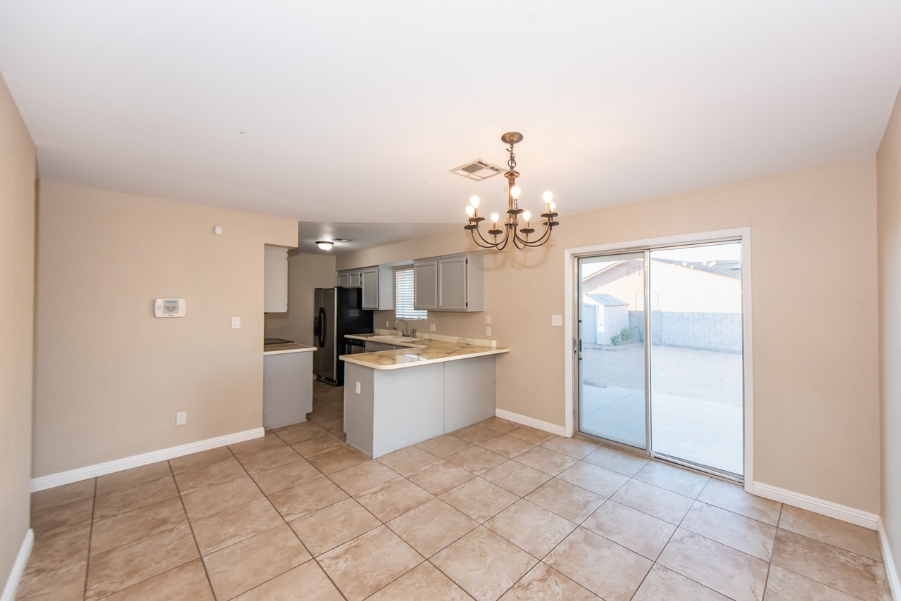 8676 E 38th Pl - Photo 3 of 26