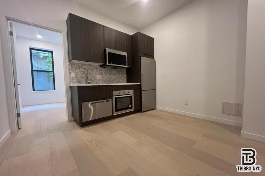 225 E 25th St - Photo 2 of 8