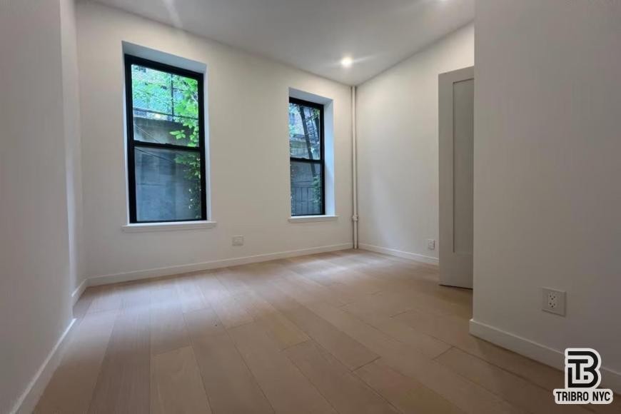 225 E 25th St - Photo 3 of 8