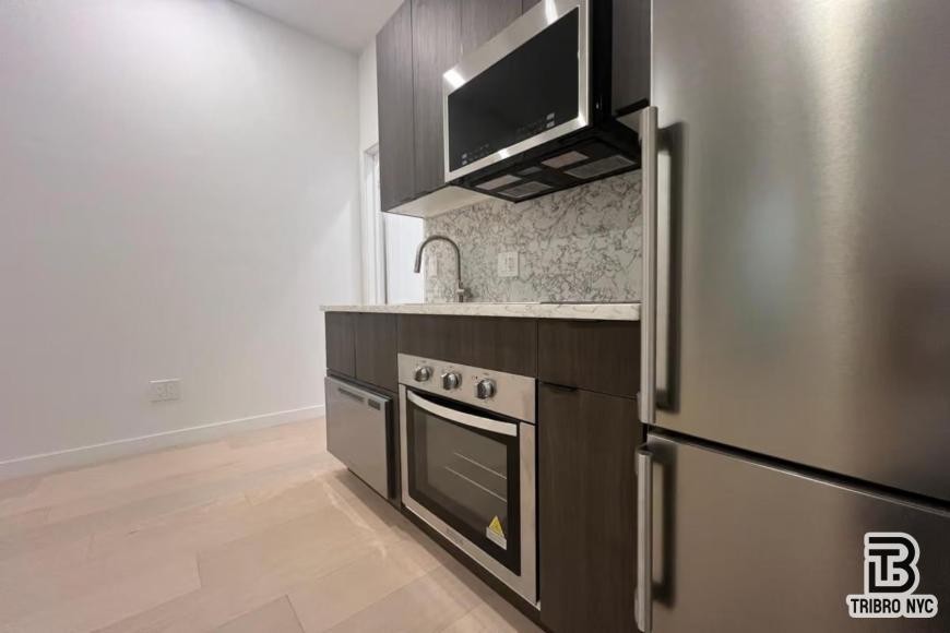 225 E 25th St - Photo 6 of 8