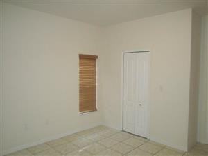 3180 NW 12th Pl - Photo 3 of 4