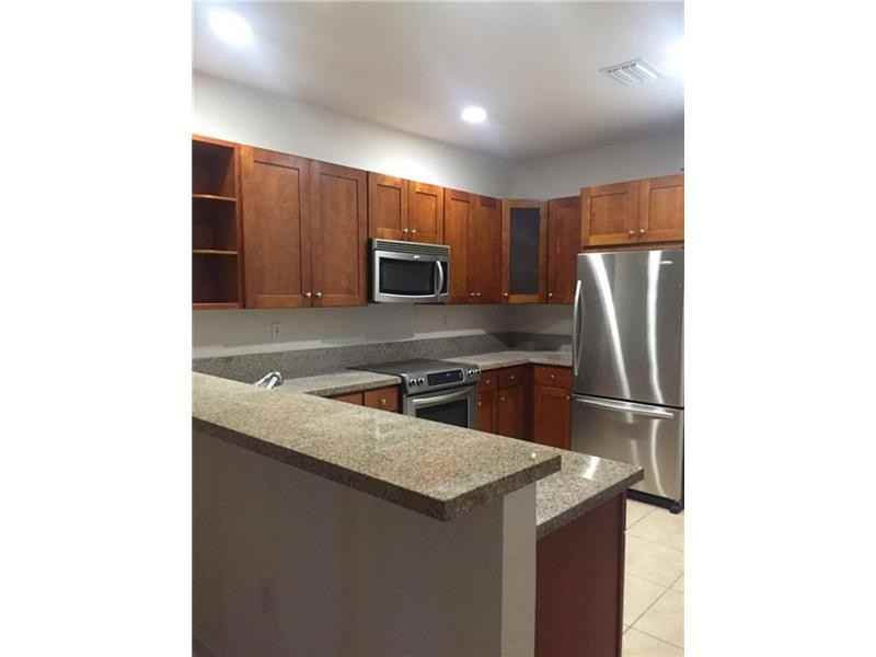 10716 NW 76th Ln - Photo 2 of 2