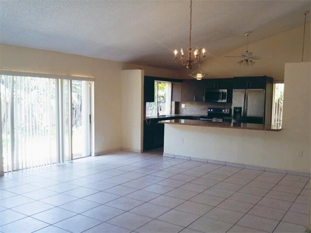 935 NE 207th Terrace - Photo 2 of 8