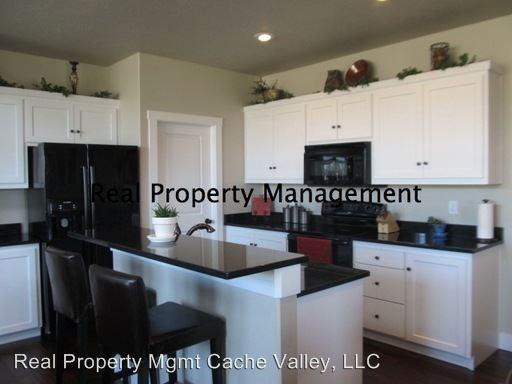 2395 Nibley Rd - Photo 2 of 11