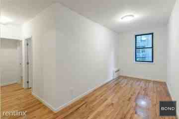 338 E 53rd St - Photo 2 of 2