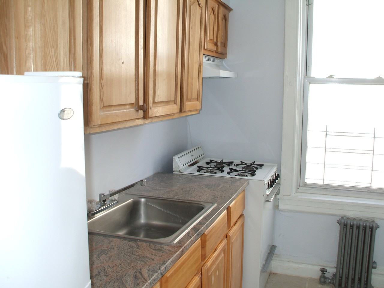 75-13 101st Ave - Photo 3 of 4