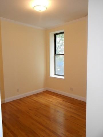 332 E 48th St - Photo 2 of 3